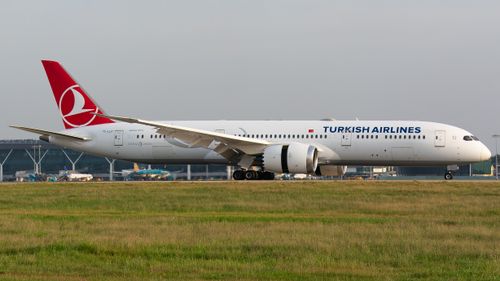 Free Turkish Airlines Boeing 787 Dreamliner at airport runway, ready for takeoff. Stock Photo