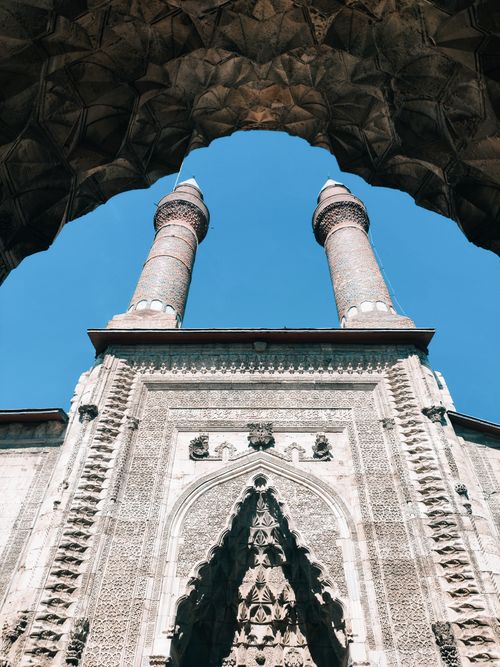 Free A stunning view of the Twin Minaret Madrasa, showcasing intricate architecture in Sivas, Turkey. Stock Photo
