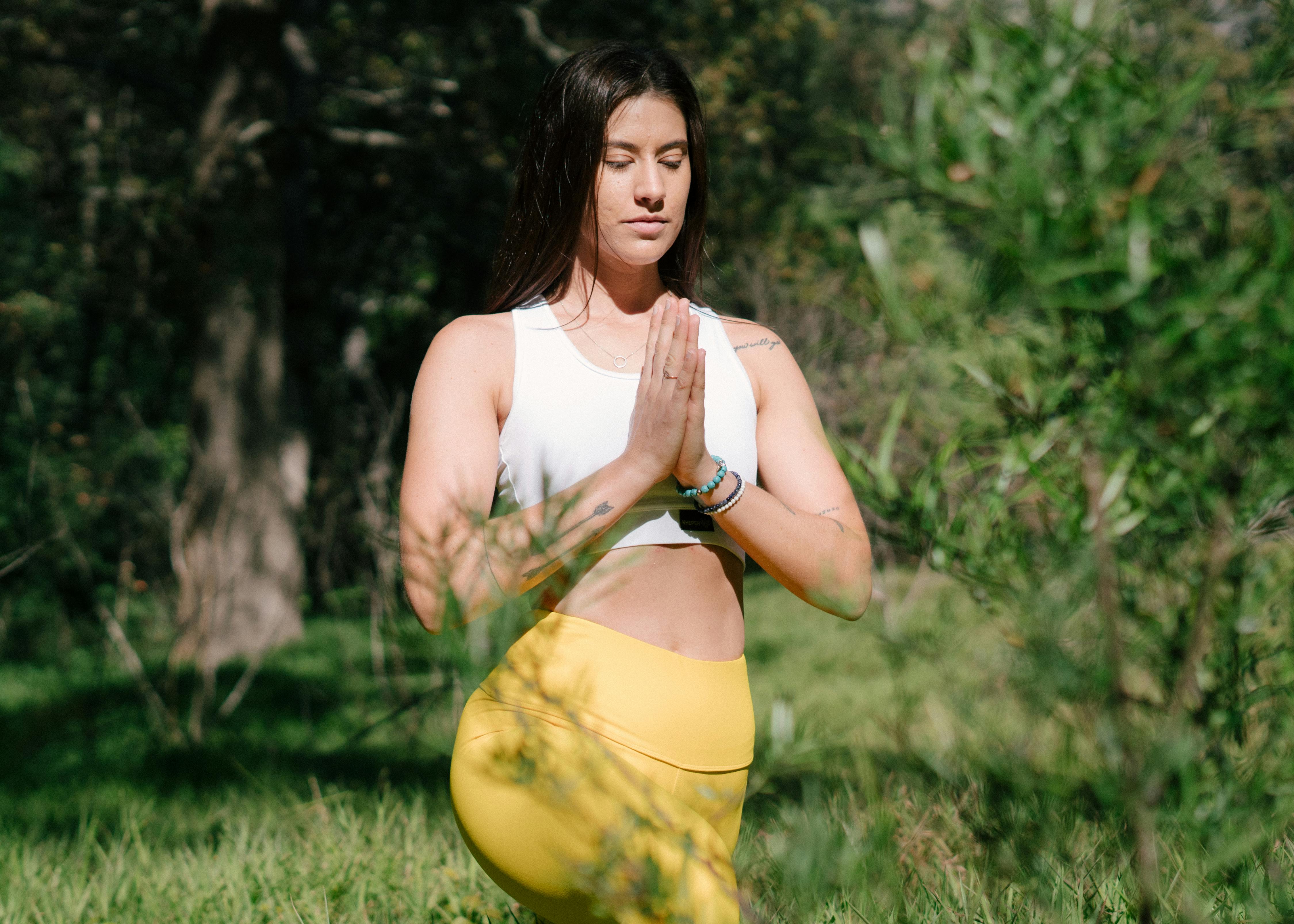 woman practicing yoga