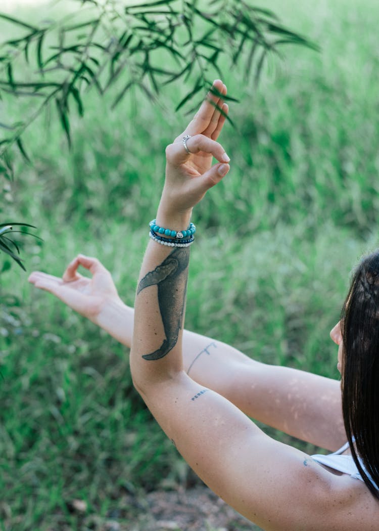 Tranquil Woman Doing Yoga In Park