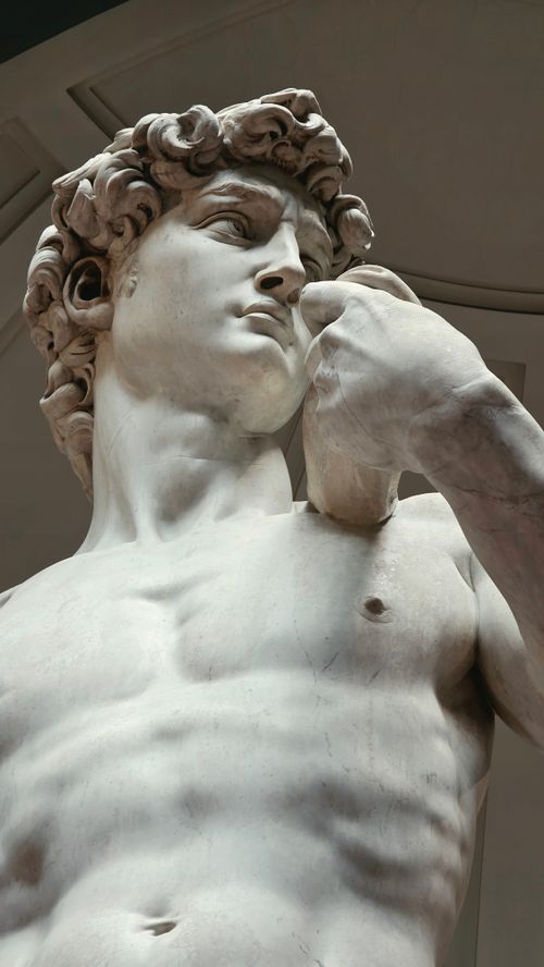 Free Close-up of Michelangelo's David sculpture, showcasing its intricate details and artistry. Stock Photo