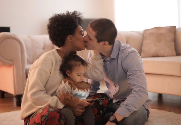 Photo Of Man And Woman Kissing