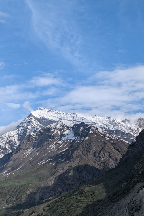 Free Majestic snowy mountains and clear blue sky in Lahul, HP, India, a perfect nature escape. Stock Photo