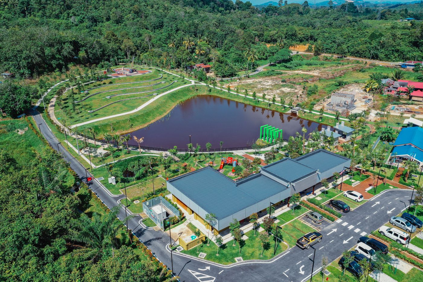 Aerial of a cottage cluster arranged around a central green
