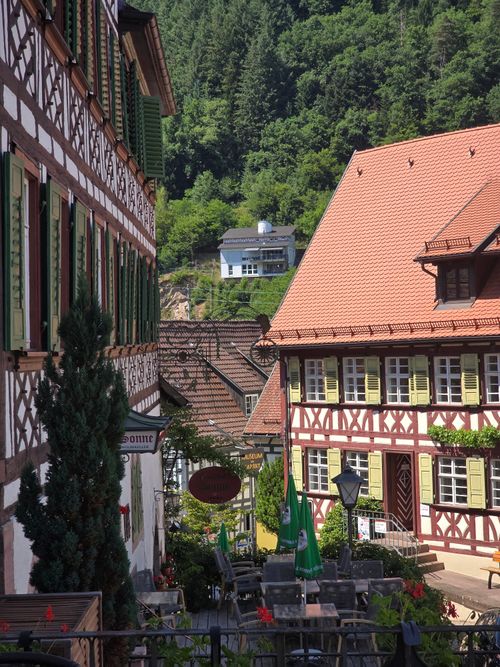 Free Picturesque view of traditional German architecture in a scenic village setting. Stock Photo