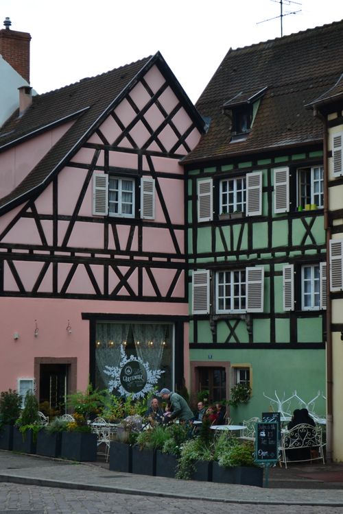 Free Picturesque scene of half-timbered houses in Colmar, France, showcasing traditional Alsatian architecture. Stock Photo