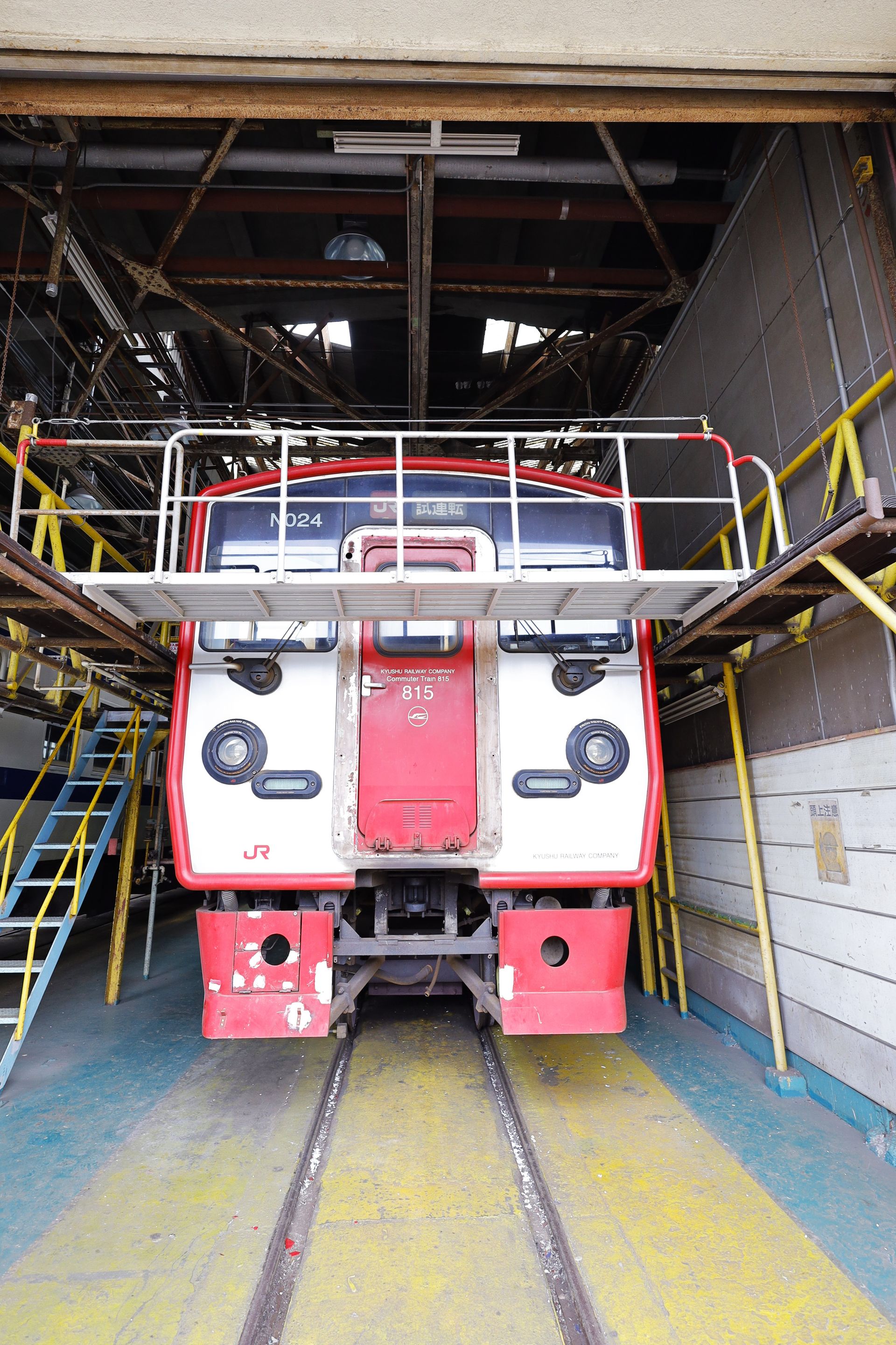 Japanese train inside a railway maintenance facility