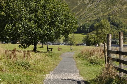Free Scenic view of a peaceful pathway surrounded by greenery in the English countryside. Stock Photo