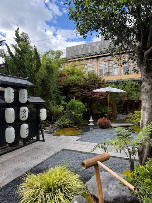 Free Tranquil Japanese garden with traditional lanterns in Dali, Yunnan, China. Stock Photo