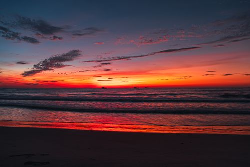 Free Breathtaking sunset view over the ocean in Quảng Trị, Vietnam with vibrant sky colors. Stock Photo