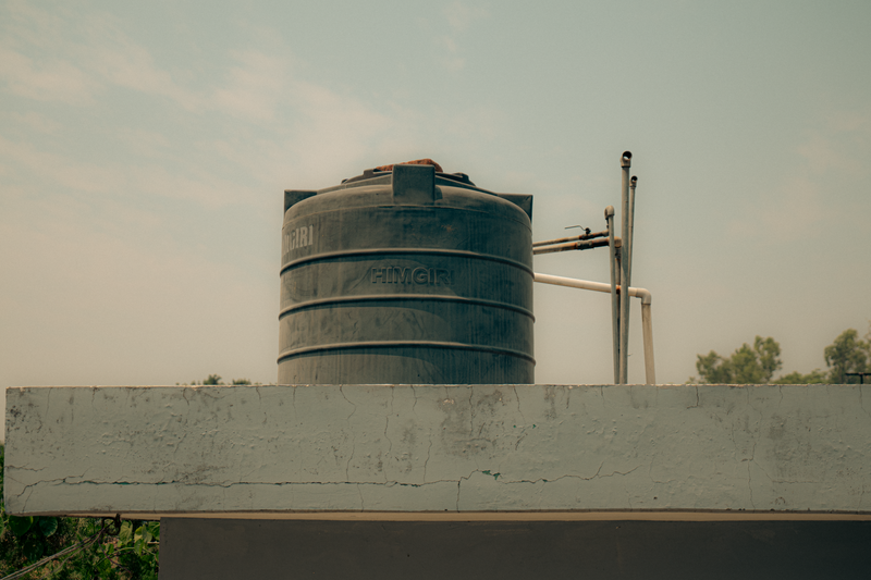 Rooftop water storage tank ready for professional cleaning and disinfection
