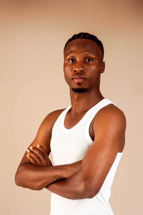 Model wearing a ribbed tank — photo by OTB frames on Pexels