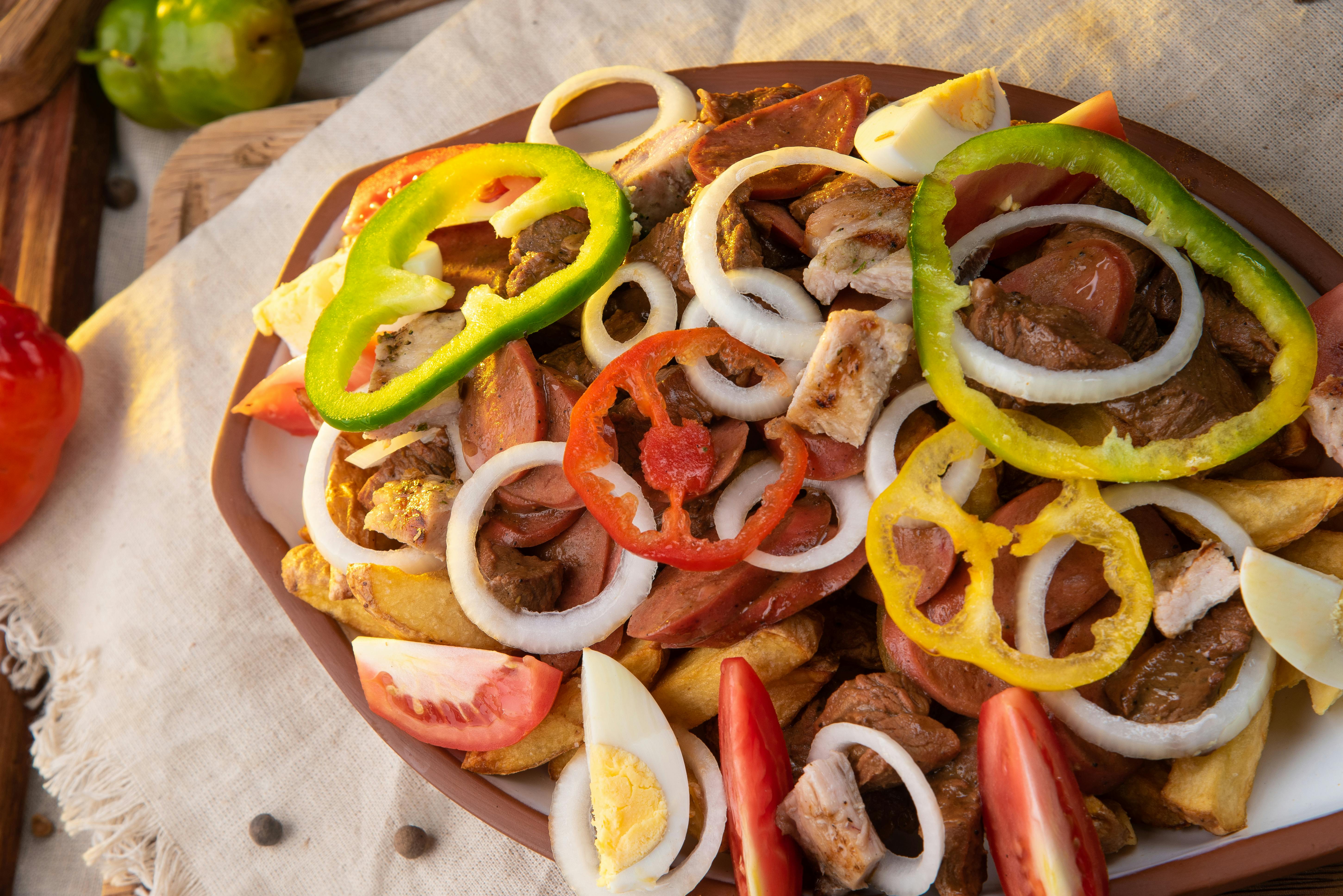 Tasty salad of chicken with fresh vegetables and boiled egg