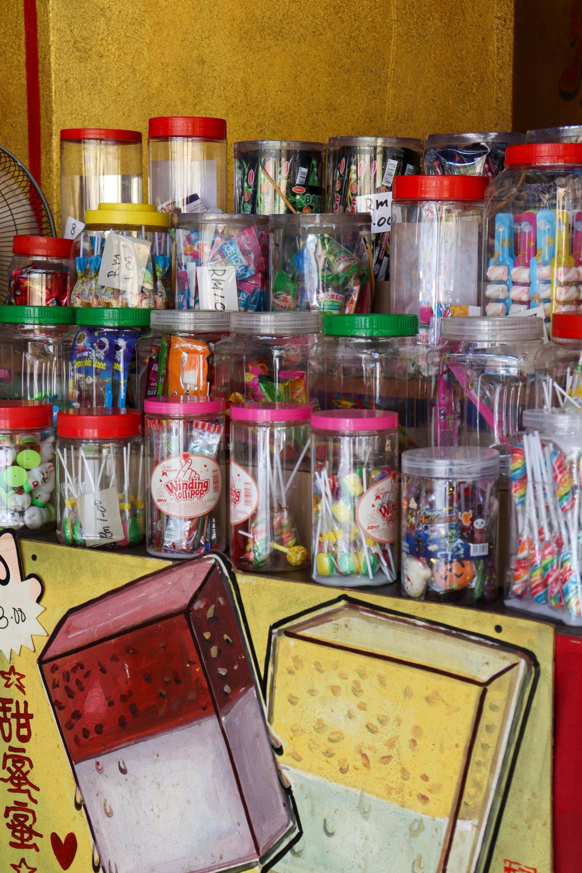Jars of vintage sweets in a shopfront window