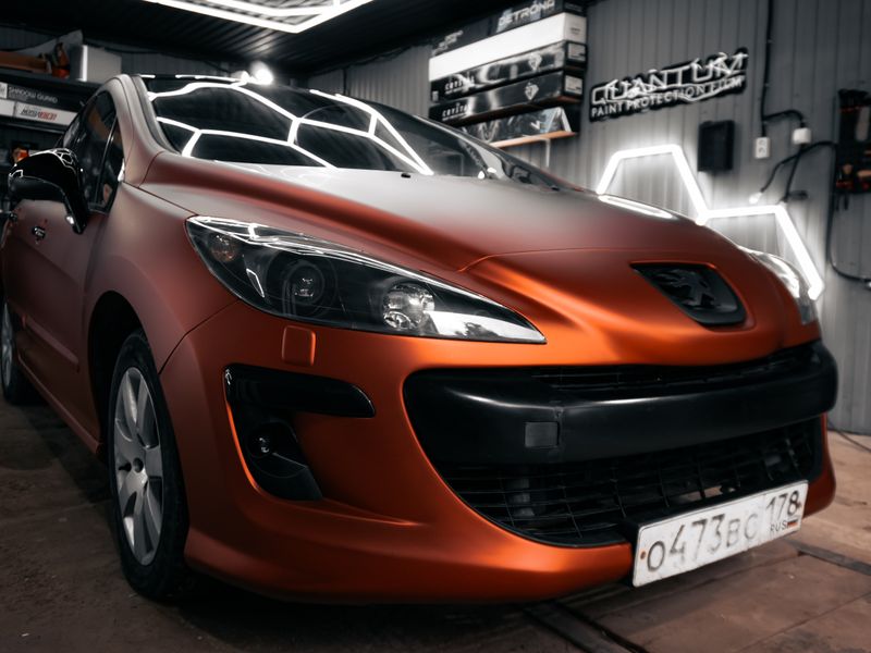 Recently serviced car inside a professional automotive workshop