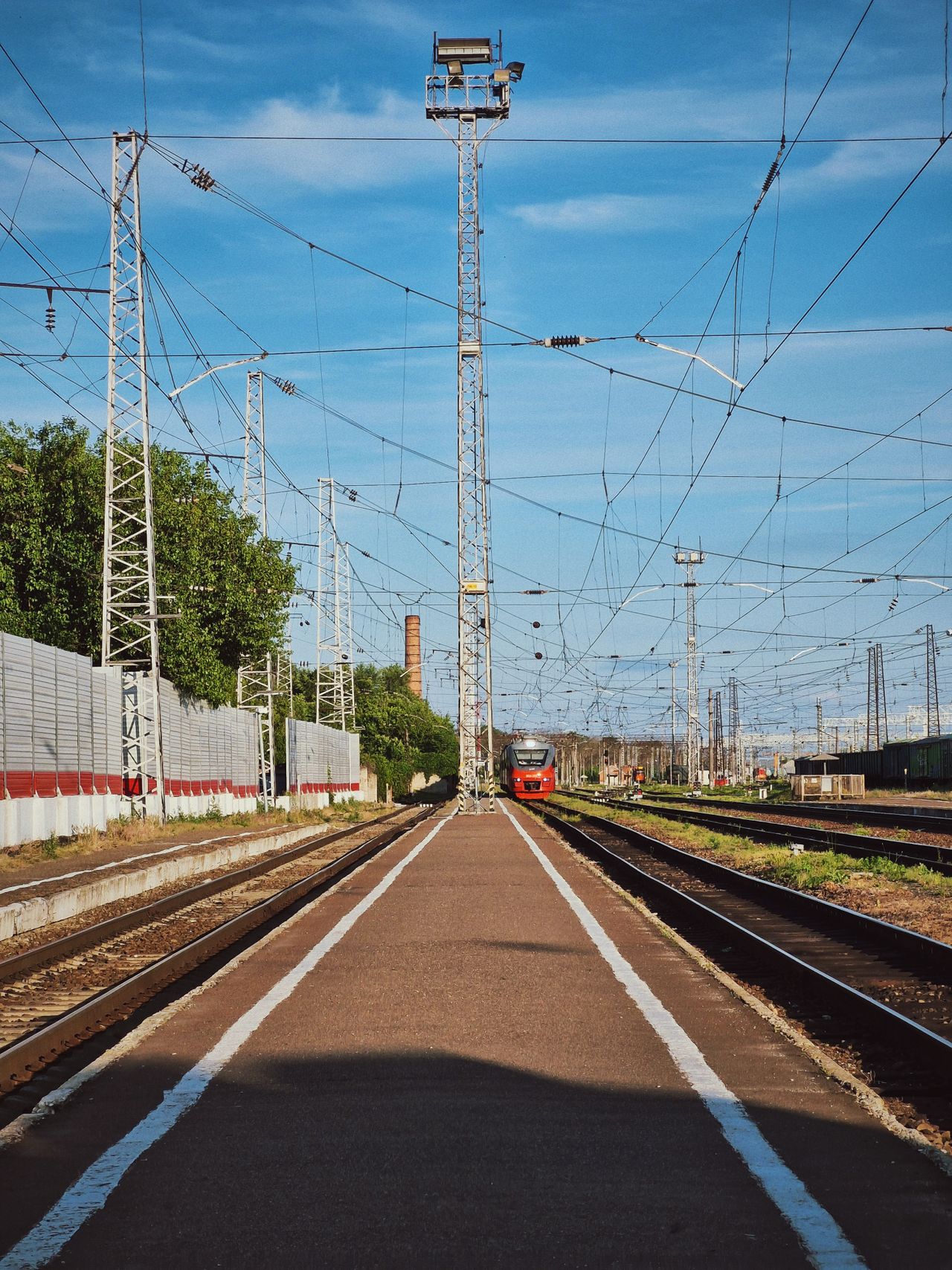 Railway tracks with overhead electrical infrastructure