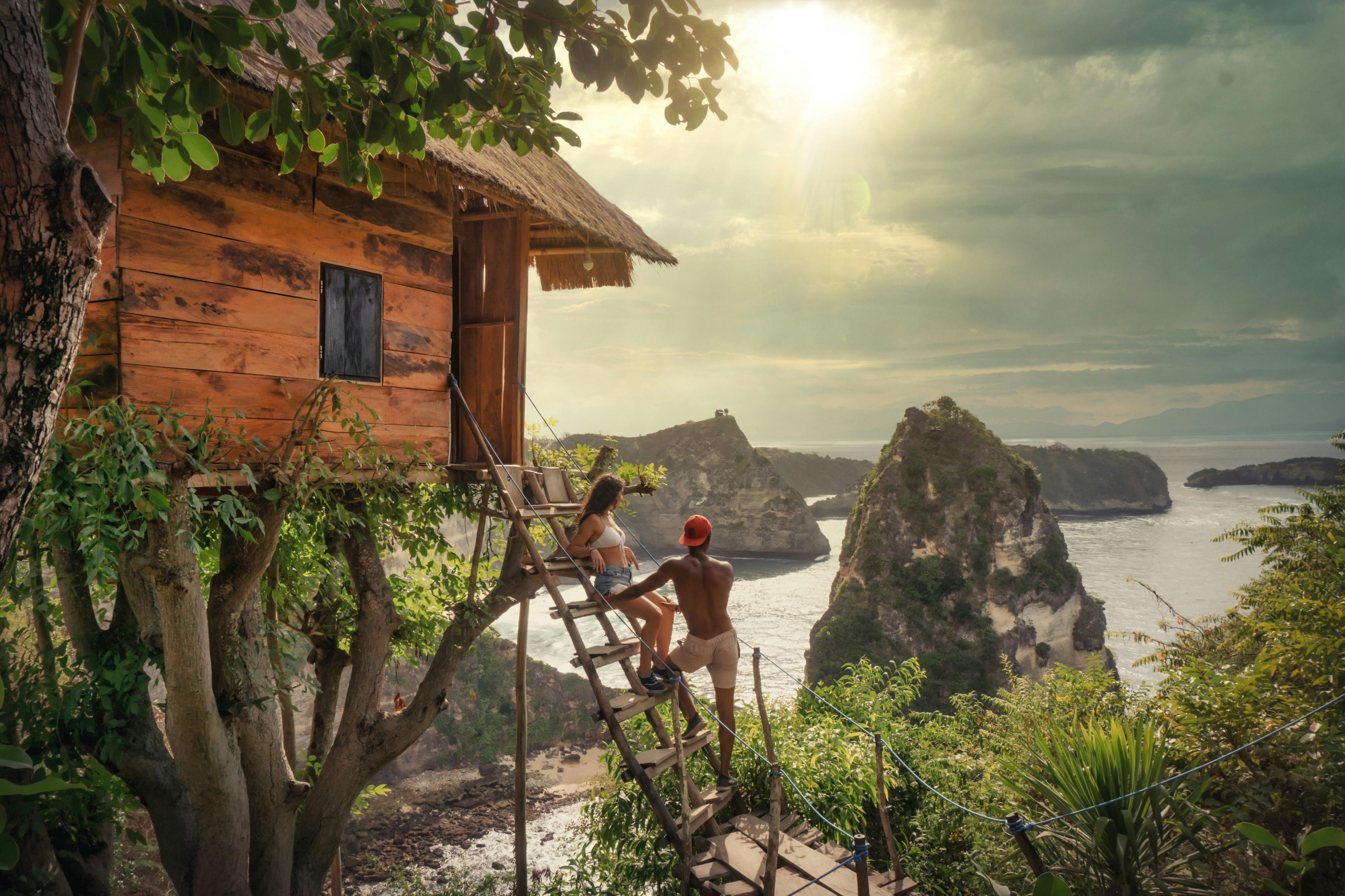 Bali, Indonesia  Couple Sitting on Brown Wooden Ladder