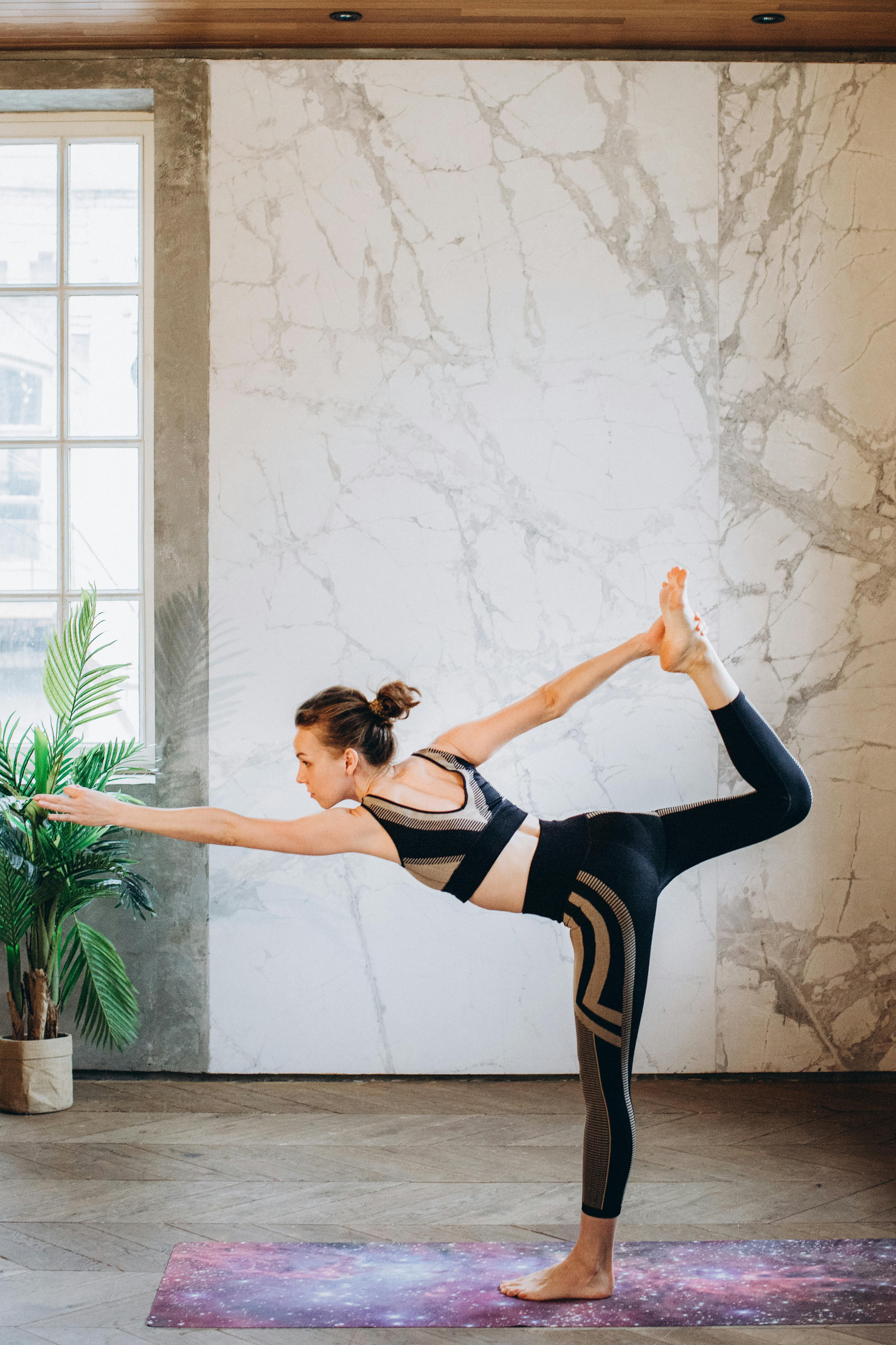 Premium Photo | Fitness, sport, people and healthy lifestyle concept -  woman making yoga in lord of the dance pose on mat over gym room background