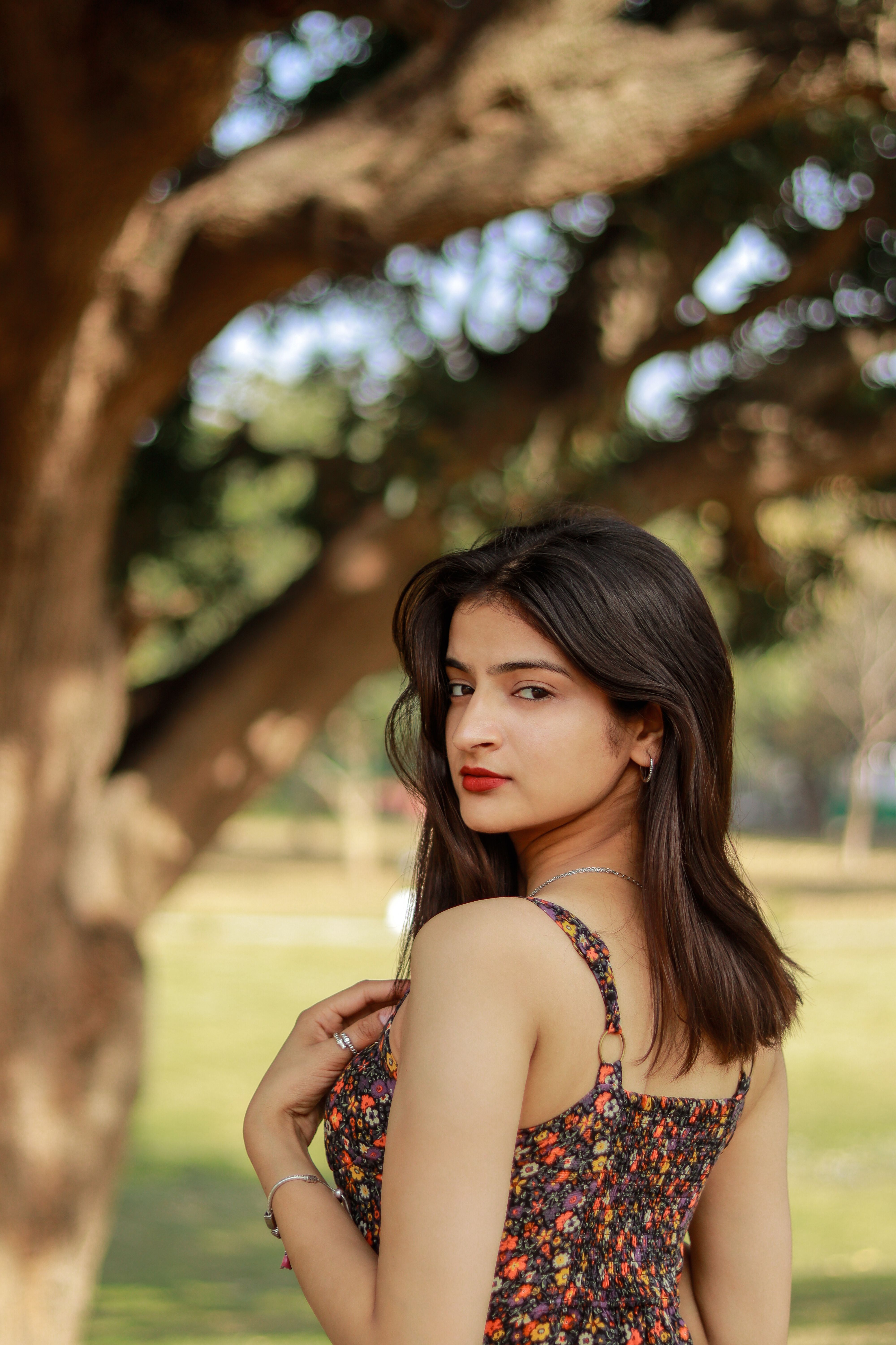 Portrait of a Woman in a Park Setting · Free Stock Photo