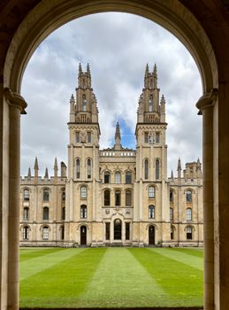 Stunning architectural view of All Souls College through an archway at Oxford University.