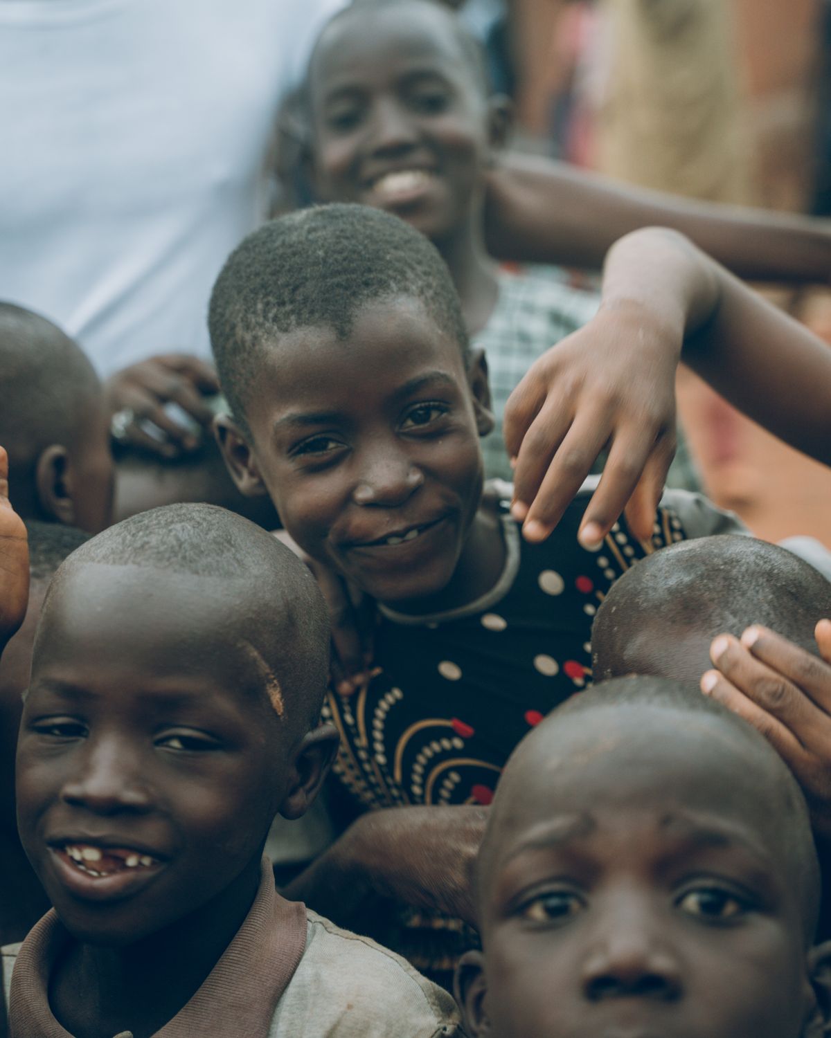 Smiling Nigerian schoolchildren gathered together