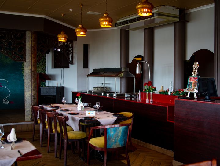 Warm and elegant dining room at The Olive Table