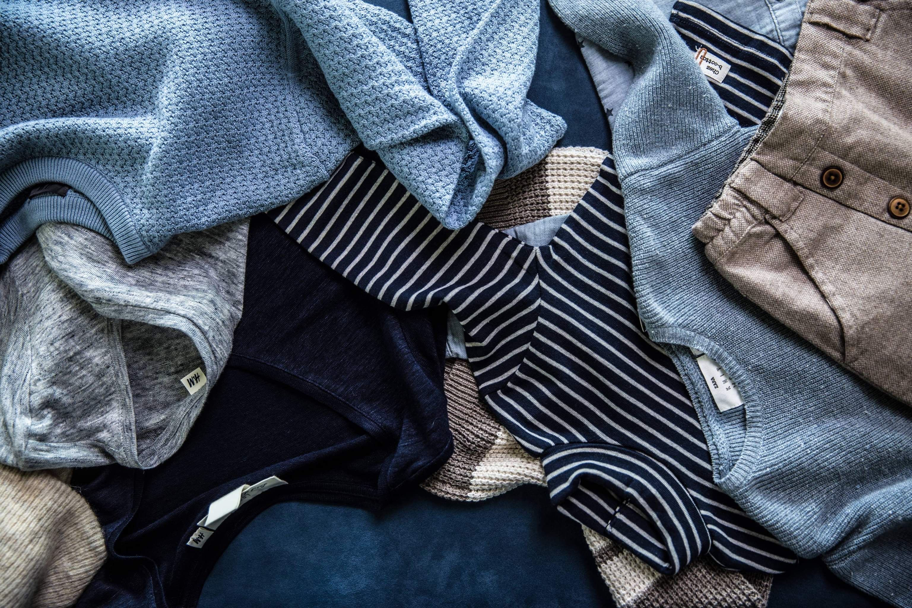 Women’s lace trim pants and lightweight knit tops displayed at the store