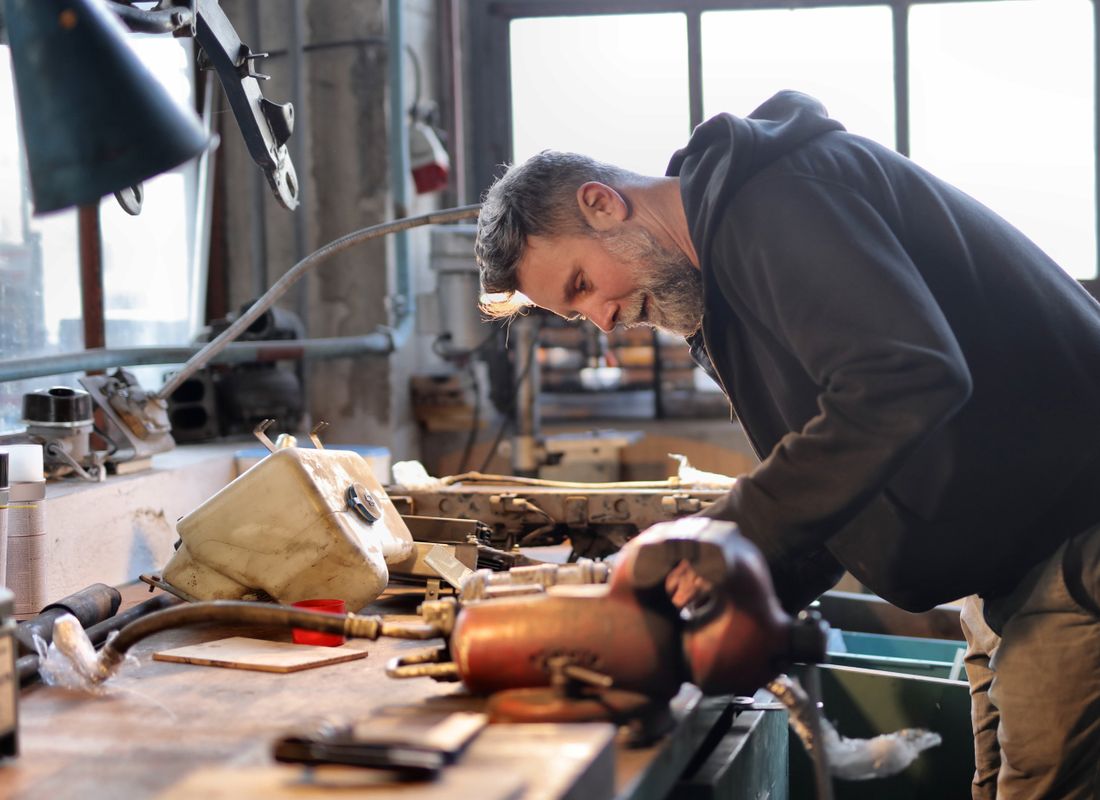 A tradesman at work in his workshop