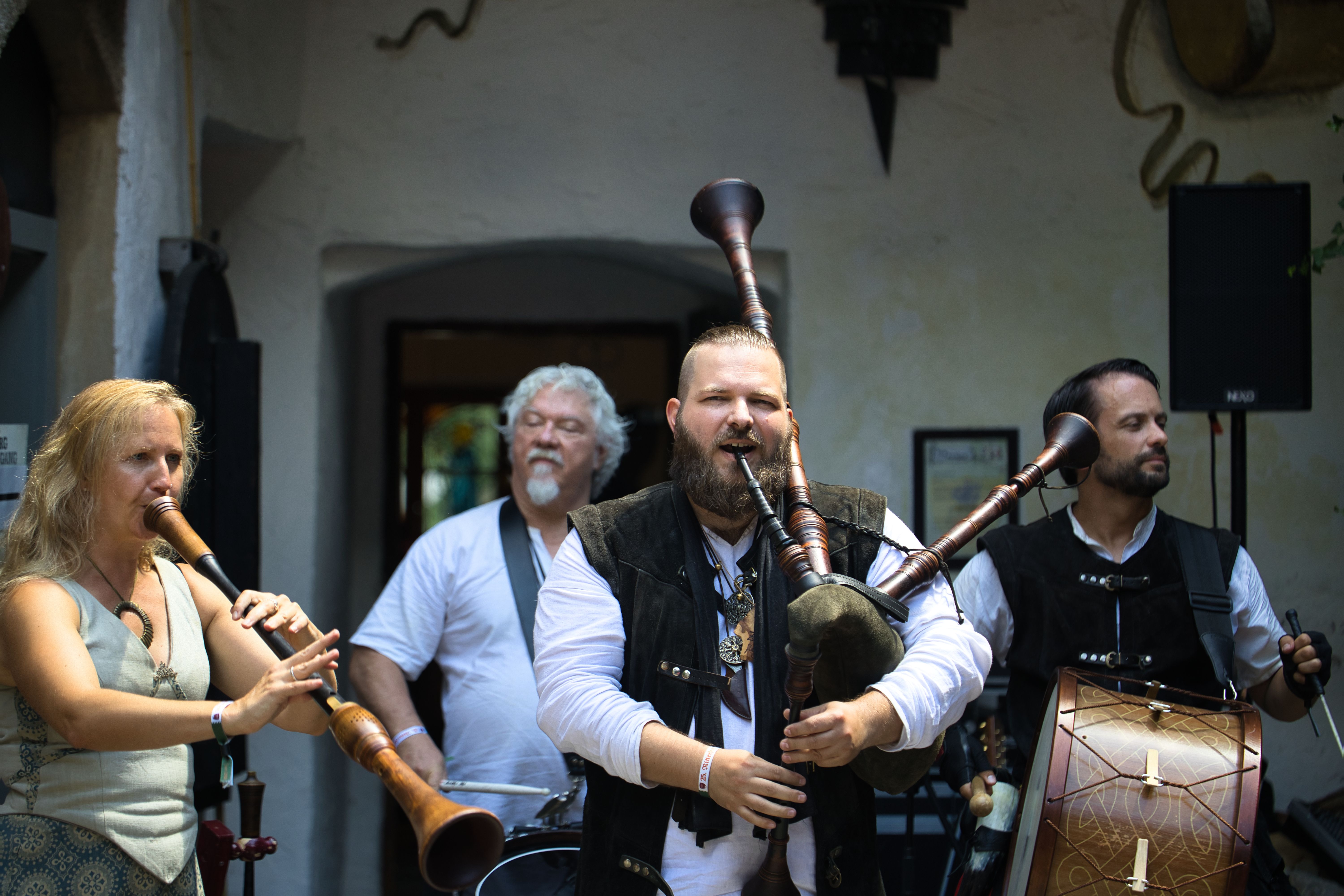 Austrian folk band playing traditional instruments outdoors in Kapfenberg, Steiermark, Austria.