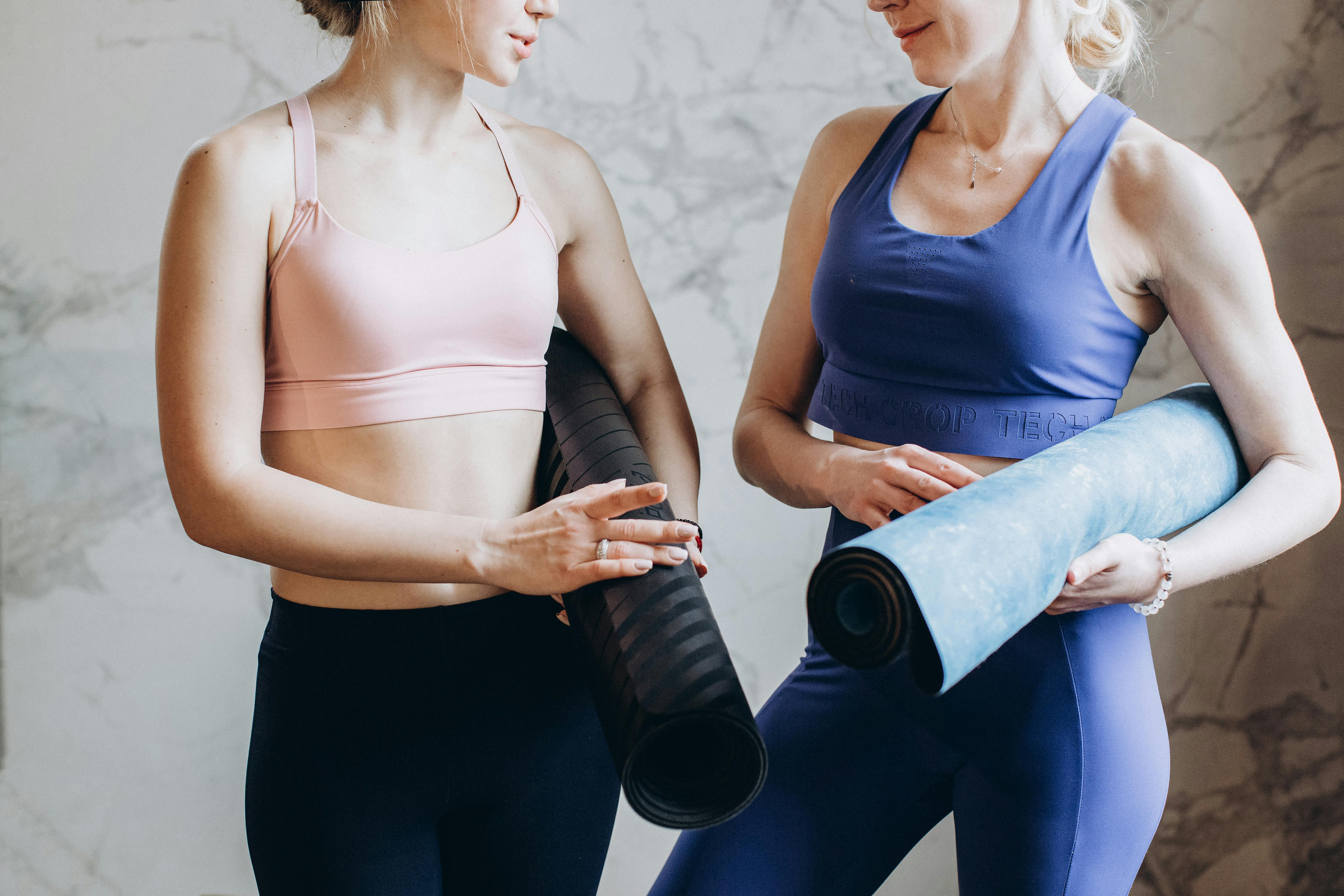 Women With Yoga Mats Talking · Free Stock Photo