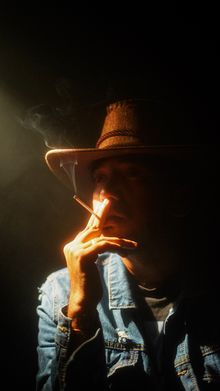 Moody portrait of a man in a hat, photo by Uday Veeru on Pexels