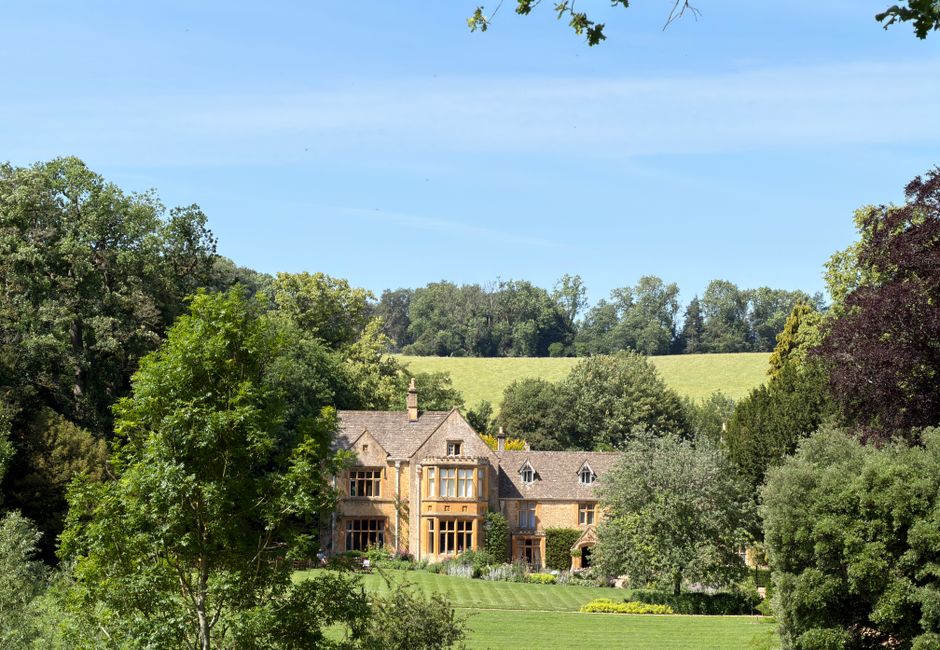 Historic English manor surrounded by lush gardens