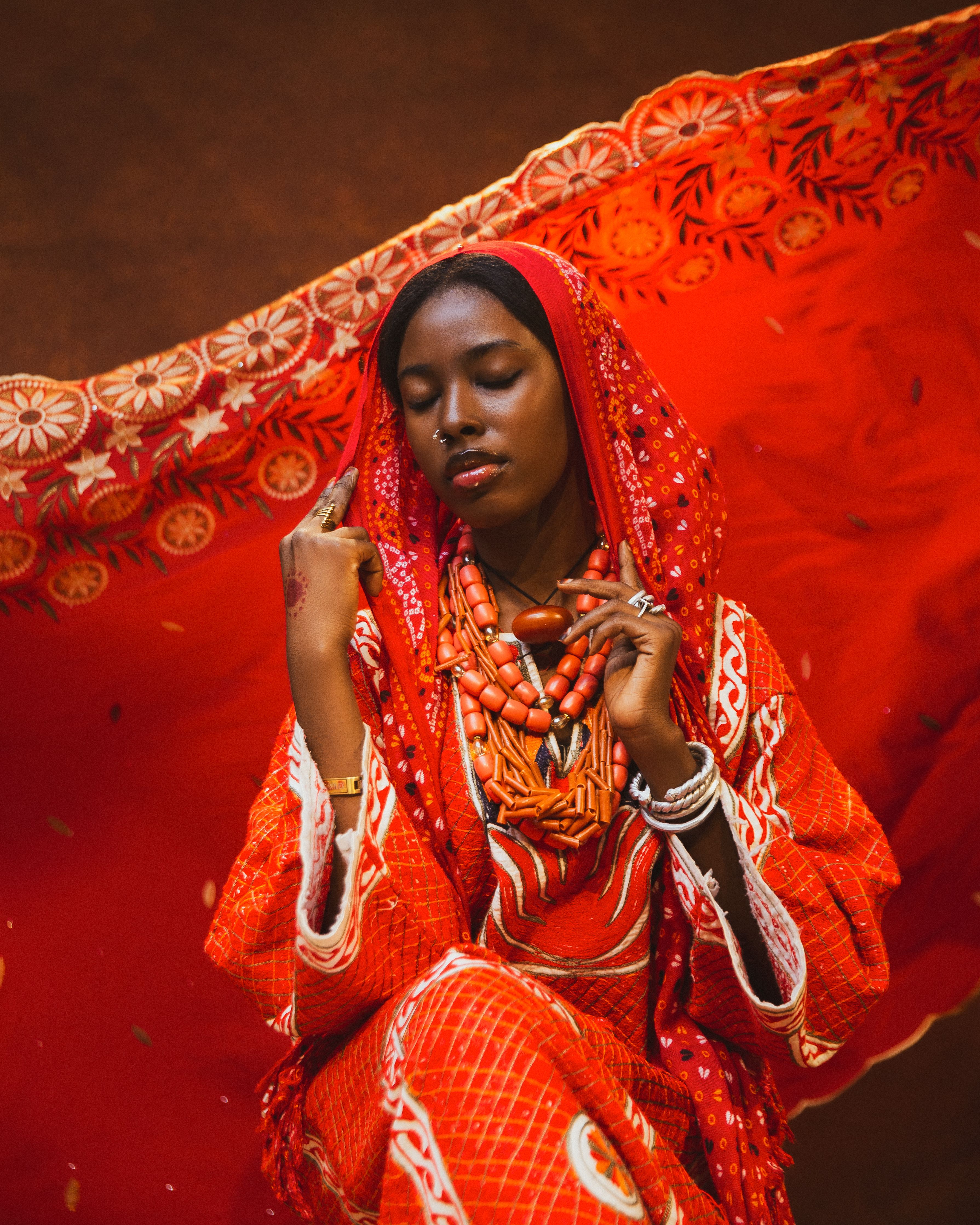 Portrait of a Nigerian woman in vibrant traditional attire celebrating culture.