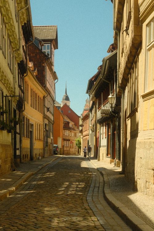 Free Explore the quaint cobblestone streets lined with half-timbered houses in Quedlinburg, a UNESCO World Heritage site in Germany. Stock Photo