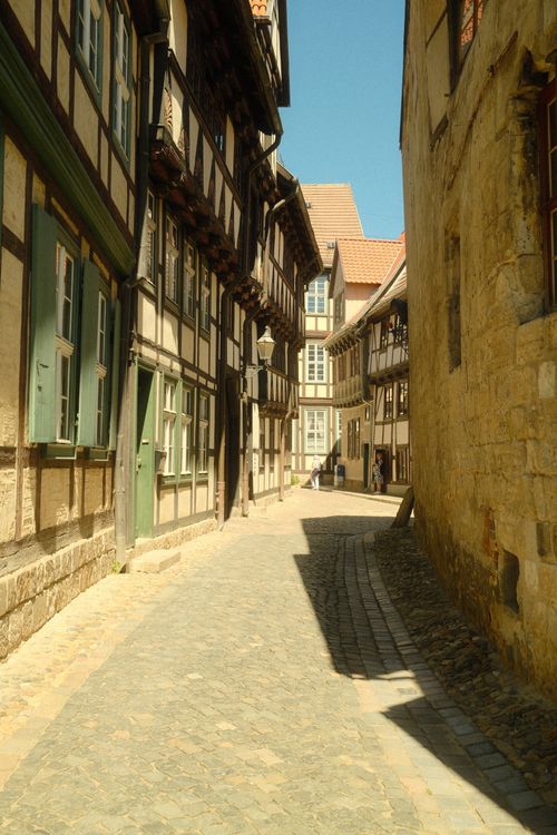 Free Charming cobblestone street with timber-framed architecture in Quedlinburg, Germany. Stock Photo