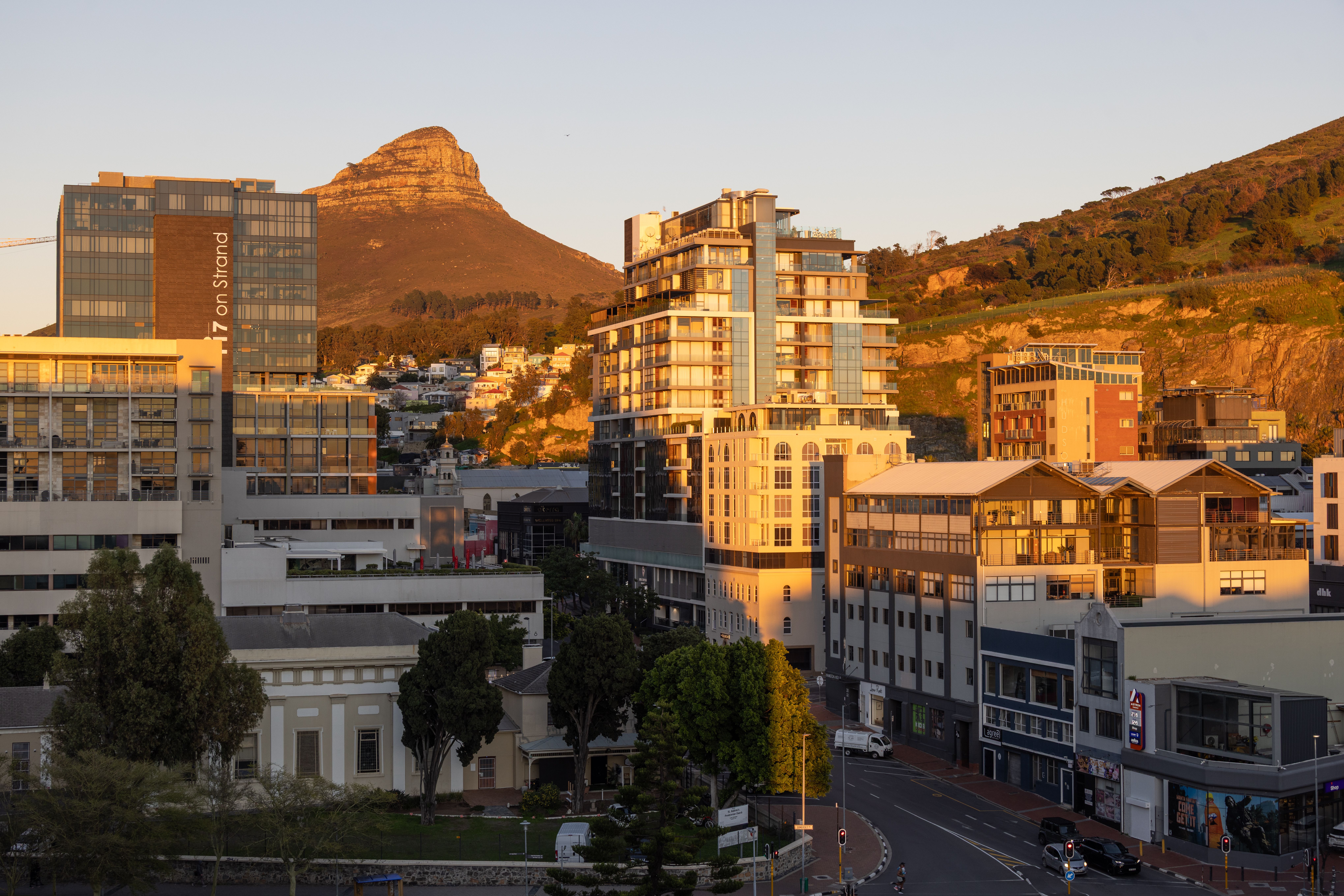 Cape Town Stadium and Green Point Urban Park seen from the promenade with Signal Hill behind