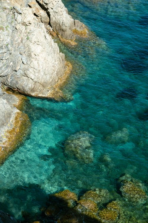 Free Captivating view of clear blue waters and rugged rocky coastline in Provence. Stock Photo