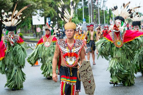 Free Colorful Dayak cultural festival with traditional costumes in Balikpapan, Indonesia. Stock Photo