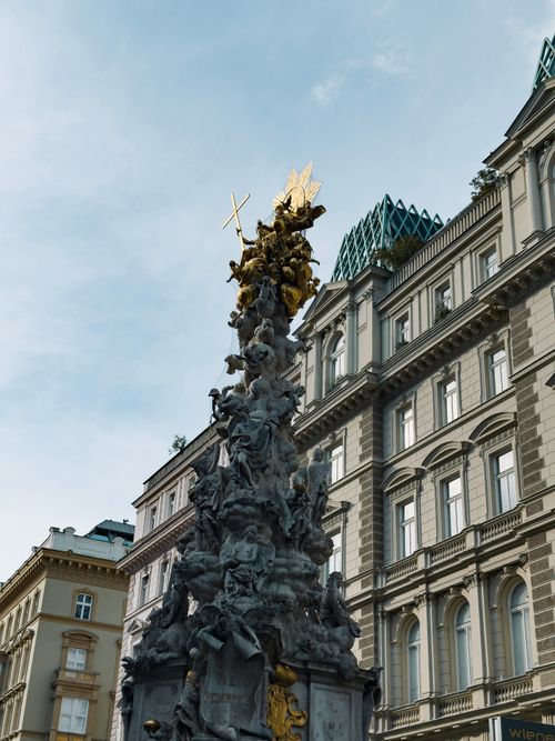Free A view of the iconic Plague Column in Graben, Vienna, showcasing its intricate baroque sculptures. Stock Photo