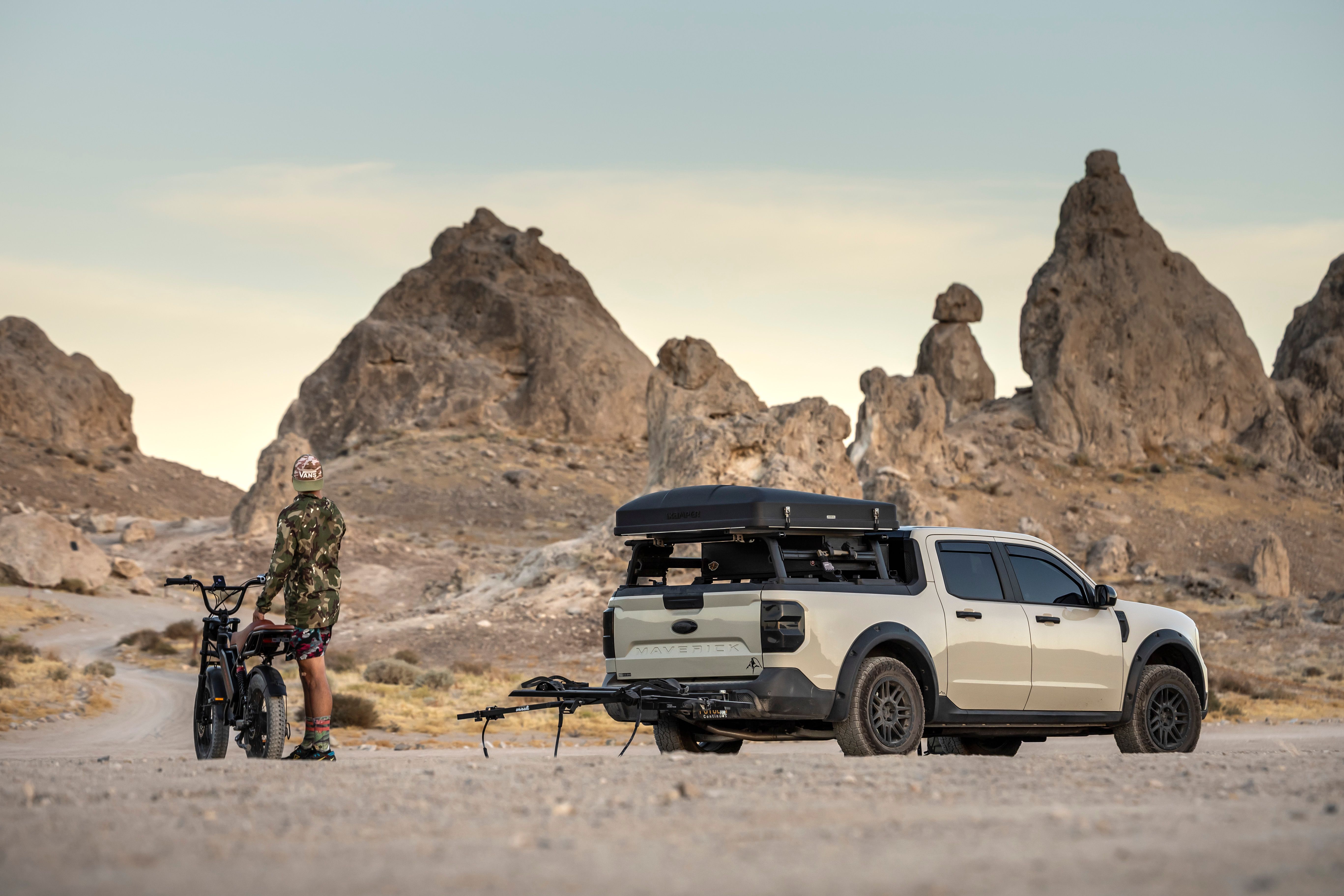 Explore the scenic desert with an off-road truck and bicycle. Perfect for outdoor adventures and escape into nature.