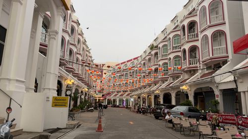 Free Charming Chinatown street with red lanterns and unique architectural buildings. Stock Photo