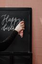 Person Erasing the Chalkboard