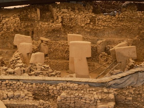 Free Explore the ancient stone structures of Göbekli Tepe, the world's oldest known temple site in Şanlıurfa, Türkiye. Stock Photo
