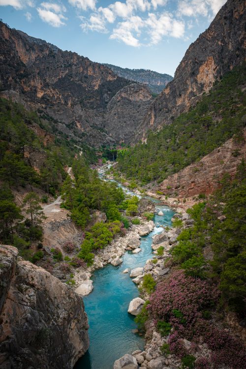 Free Explore the stunning turquoise river and majestic waterfall in Mersin, Türkiye's scenic valley. Stock Photo