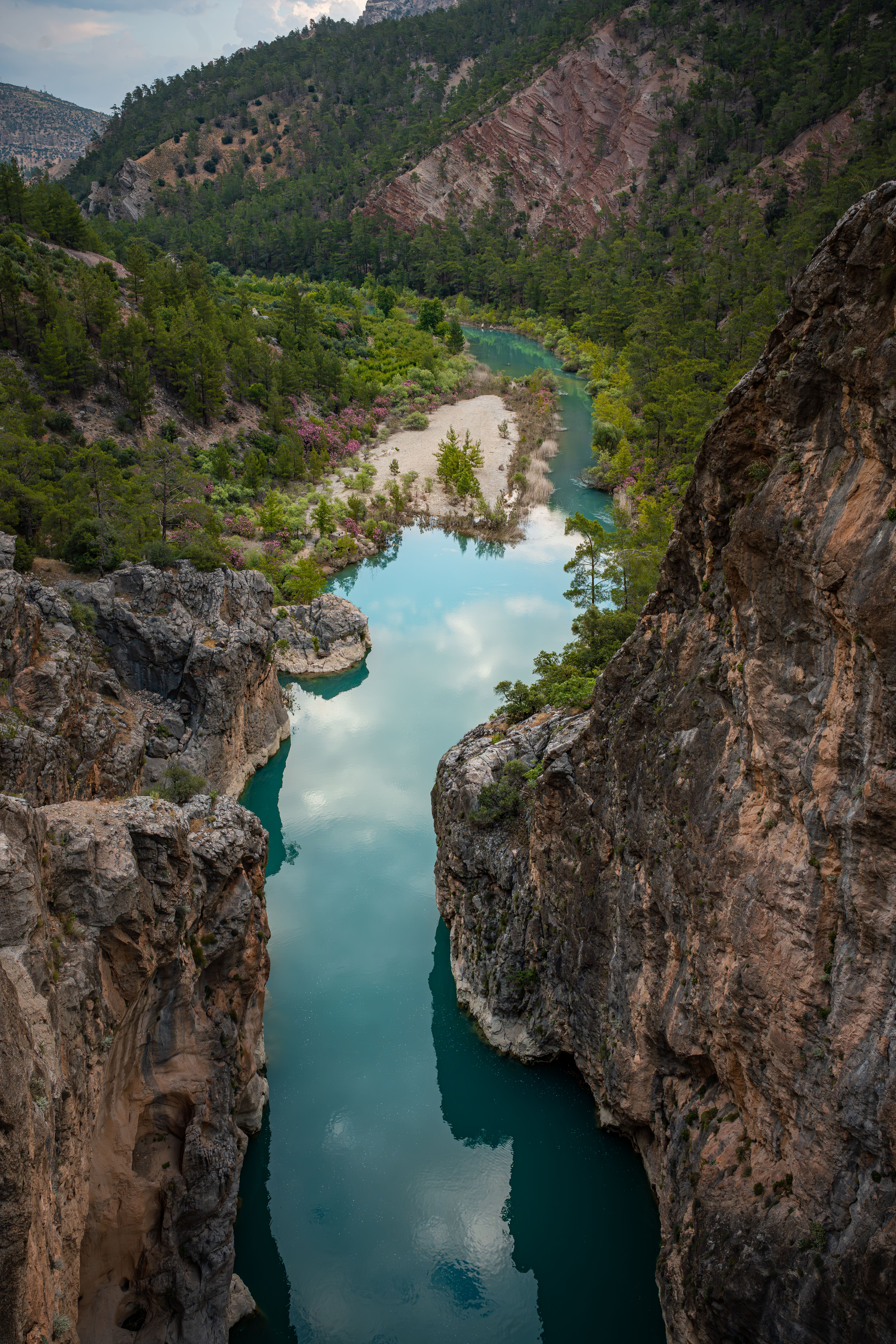 Stunning view of a turquoise river flowing through a canyon in Mersin, Türkiye.