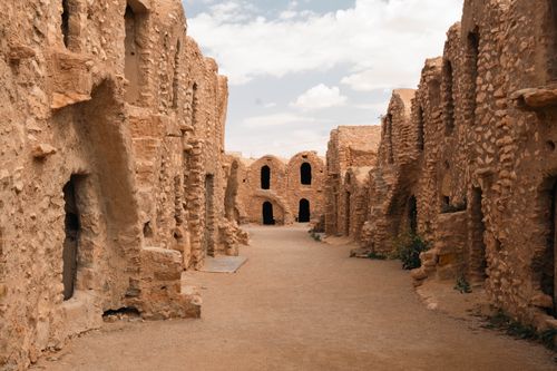 Free Explore ancient stone structures in the Tunisian desert, showcasing historical architecture. Stock Photo