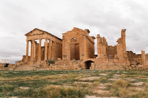 Free Explore the well-preserved ancient Roman ruins in Dougga, Tunisia. A majestic glimpse into history. Stock Photo