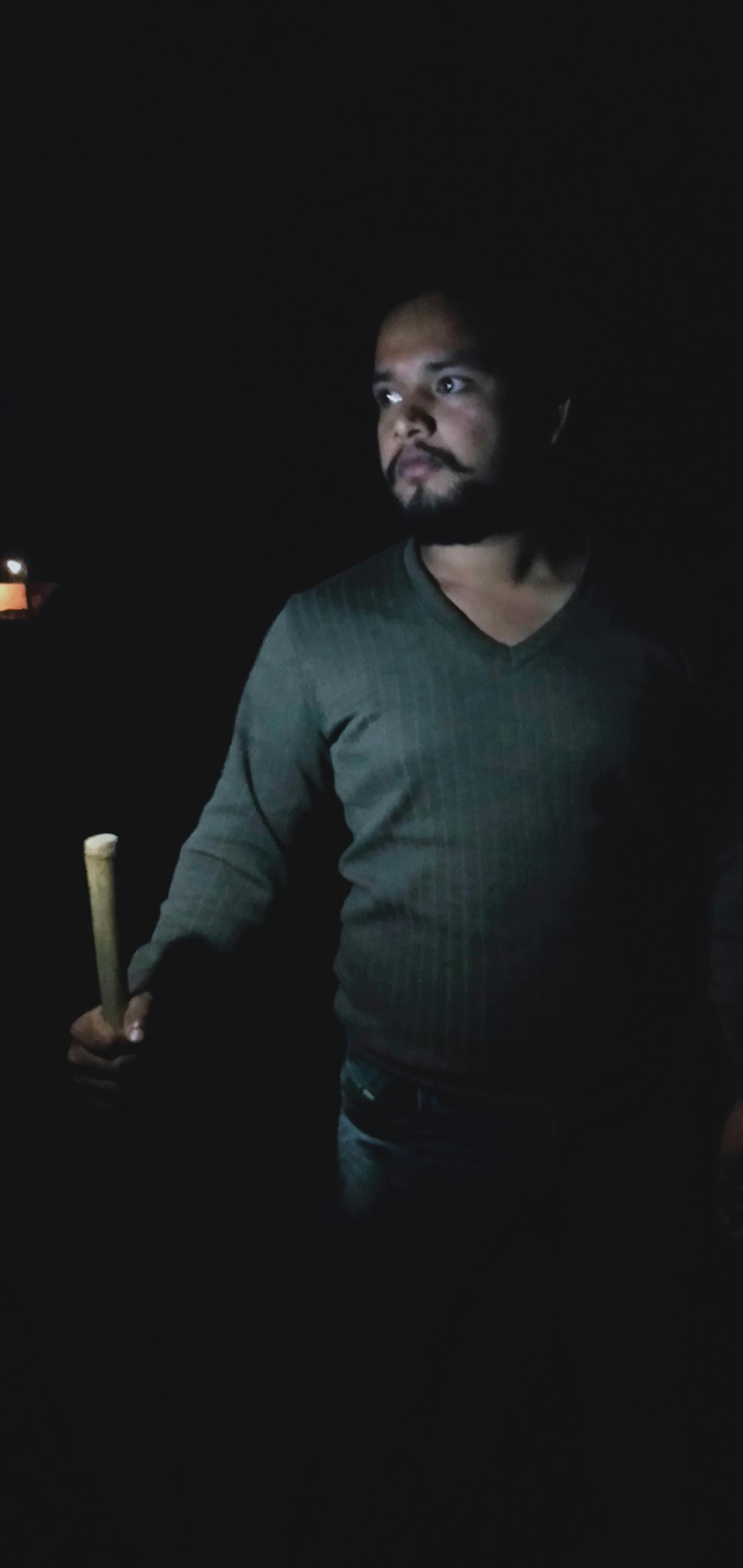 Students and young scientists using microscopes and pipettes in a teaching laboratory