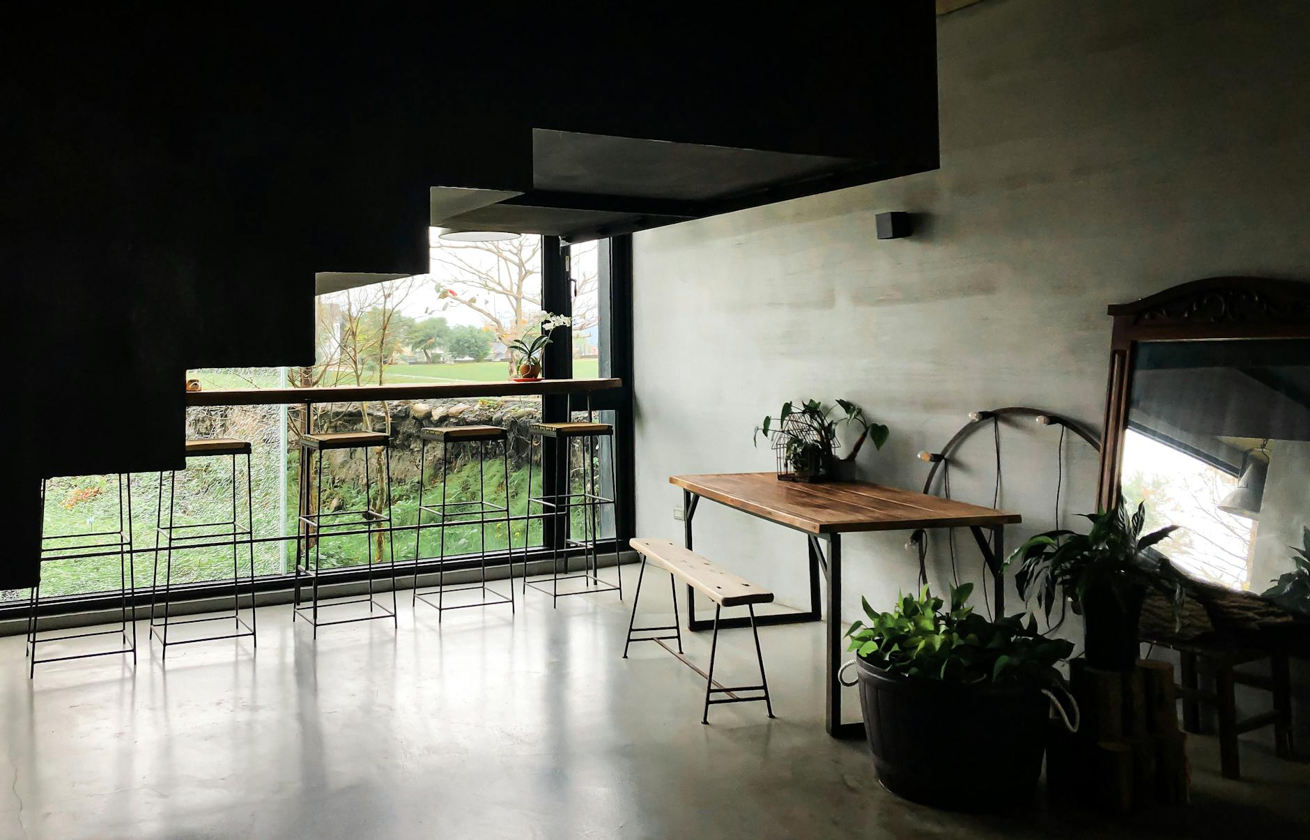 Concrete Floors With Area Rugs In A Modern Loft Setting