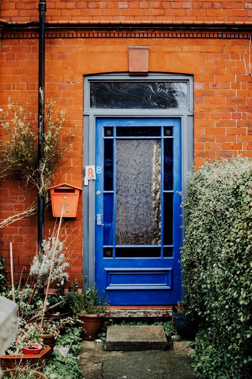 Blue Door in Red Brick House